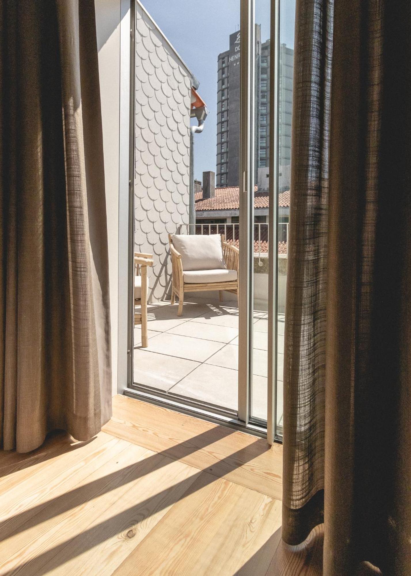 Village Aparthotel By Boa Porto Quarto foto A sliding door